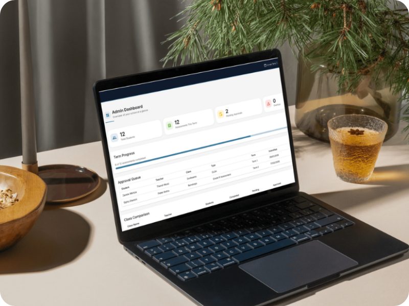 EarlyTrack platform dashboard on laptop showing assessment management, attendance tracking, and school administration overview for South African preschools and nursery schools